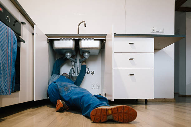 Professional Drain Cleaning technician working in Redford, MI